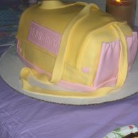 Side View Of Felicity's Baby Bag Cake This is a view from the side of the cake I made for my soon-to-be niece's baby shower. You can see the long strap and the pink side...
