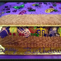 Basket Filled With Gifts 13"x27" chocolate basketweave cake with lid. Basket is overflowing with smaller cakes decorated as gifts. I did this for a friend...