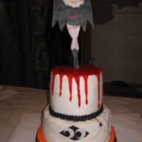 Betty Boop Halloween Cake all buttercream with an edible image plaque of betty boop. fondant details for the mummy. the bottom orange part is a brownie. tfl