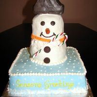 Snowman I made this cake for my companys' Christmas party to raffle off. The winner shared this all buttercream cake with all of us. :)