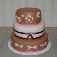 Pink & Brown Cake Stacked cake, marshmallow fondant and ribbons. For a 14 year old's birthday party.