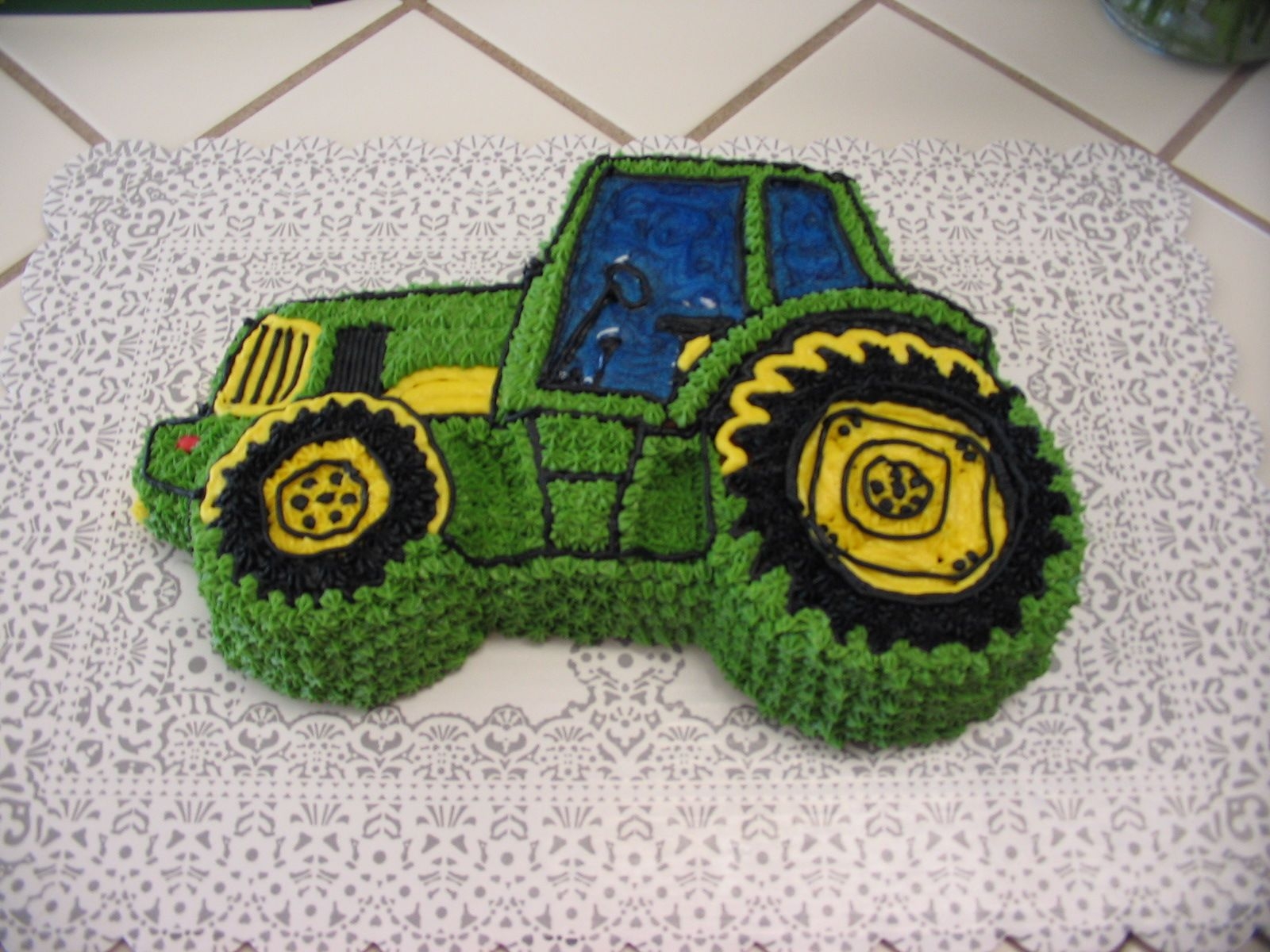 John Deere 1St Birthday Cake John Deere tractor pan cake with star tip buttercream frosting.