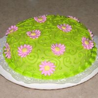 Pink Daisies Just a cake I did for fun. Green swirls and dots with pink royal daisies.