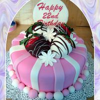 Strawberry Birthday Cake Fondant covered cake with dipped strawberries on top (per customer) and gumpaste topper.