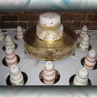 Mini Wedding Cakes Done for a wedding. Each tier covered in rolled fondant. Alot of work!