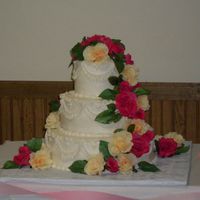 Wedding Cake 3 tier cake with buttercream frosting and fresh flowers