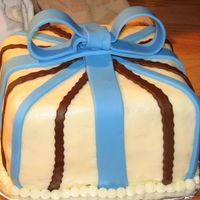 Birthday Present Frosted in butter cream decorated in fondant