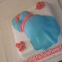 Belly Cake Fondant covered and decorated cake.