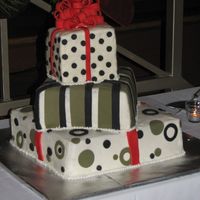 Christmas Present Cake Cake for a Christmas wedding. Frosted in butter cream, decorated with fondant. My first wedding cake.