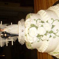 Anniversary Cake This is an anniversary cake using the cake topper they used on their wedding cake 40 years ago.