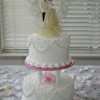 Small Wedding Cake This cake is a two tier buttercream frosted little lovely creation. Buttercream is allowed to "crust" then papertoweled gently to...
