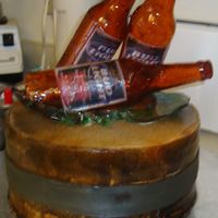 Beer Bottle Cake Here is my first attempt at a beer bottle cake. It was alot easier that I thought and hopefully the next one will be alot better.