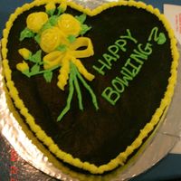 Practice Roses Here is a cake I did to practice making roses. I had nothing else todo with it so I took it bowling with me.