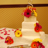 Summer Wedding Fresh flowers on fondant covered cake.