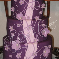 Purple Dessert Buffet This cake was the centerpiece of a purple and gold-themed 57th Class Reunion reception. The cake was a dummy 6-8-10 covered with fondant...