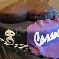 Wrestling Groom's Cake This cake was done as a surprise by one of my brides for her groom, who is a professional wrestler. We used his two wrestling uniforms and...