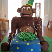 A Monkey Birthday This cake was done for my godson's 6th birthday. The monkey started with a PVC skeleton and was sculpted from a modeling chocolate/RKT...