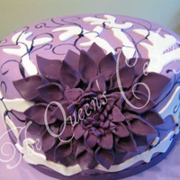 Purple Flower This cake was inspired by the design by TheSweetestThingCS. 8" pink champagne cake with Bavarian Cream filling. Iced with vanilla...