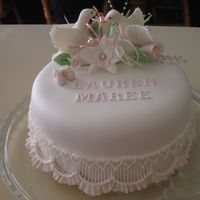 Lauren Maree I made this for my Daughter's Christenining Day. The inspiration for the decorations came from my own wedding cake from many years ago...