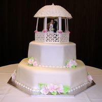 Robert & Natarsha Wedding Cake This cake was actually for a small wedding. The top tier was chocolate mud and the bottom is a foam block. It was decided that after the...