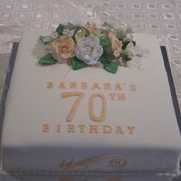 Barbara 70Th Birthday This was a 13" Caramel Mud cake. This was a pretty cake despite the shear size of the cake.
