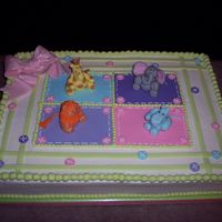 Baby Animals Baby shower cake for a friend. The animals and all other decorations were fondant and/or gumpaste. Design came from the shower partyware,...