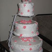 Pink Daisy Wedding Cake This simple wedding cake that I did for a friend of mine turned out to be quite fun and she loved it. The base and flowers are all...