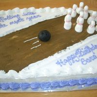 A Bowling-Themed Cake I made this for a girls bowling party. The pins are all 3 dimensional and are made with stiff buttercream that I shaped into pins. The ball...