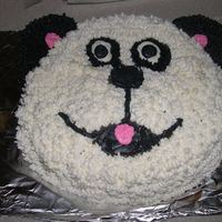 Panda/dog Cake my 4-year old actually "helped" me with this cake - and he wanted LOTS of icing!....he kept insisting that it was a dog, even...