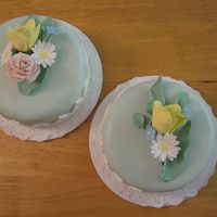 Mother's Day Cakes Chocolate cake with "Ding Dong" filling, wedding white frosting, fondant and fondant/gum paste flowers.