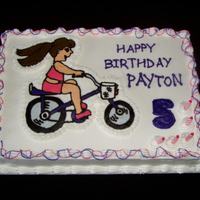 Purple Bicycle Cake This was for a little girl who wanted a b-day cake with a picture of her on her purple bike on the cake. The image is a BCT.