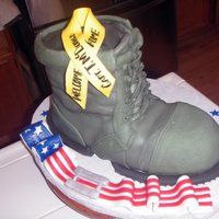 Welcome Home Captain T Mcdonald 2 carved 10" squares of red and blue velvet cake. Used a texture mat for the shoe's suede leather. All Michelle Foster's...