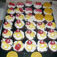 Fireman Cupcakes For a 4 year old aspiring fireman:) Choc mold for hats , trucks, and shields.