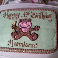 Little Monkey Cake little brown monkey holding a banana for