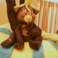 Fondant Monkey First time making a Topsy turvy cake and fondant monkeyVanilla and Chocolate cake with buttercreme and MMF