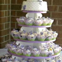 Sara's Cupcake Tower 4 types filled cakes, buttercream icing, fondant flowers,. 3 tier mini presentation cake