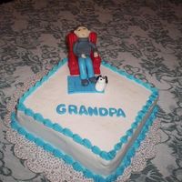 Grandpa I actually did this cake for my husband - it was for Grandparents day. The chair is plastic - the "grandpa is made of fondant as well...