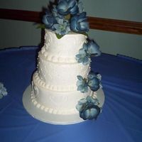 Wedding Cake I did this cake this weekend. I personnally do not like the flowers. The bride picked them out - they are silk. I think just putting a...