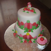 Strawberry Shortcake Cherry Chip cake with vanilla buttercream filling and an example of the corresponding cupcakes.