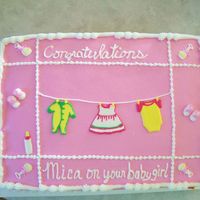 Baby Shower For Girl Buttercream with royal icing decorations. THanks for looking