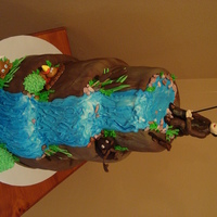 Hunting, Fishing Cake this was my dad's birthday cake. first cake i delivered far from home (an hour and 20 minutes) that was stacked. well i didn't do...