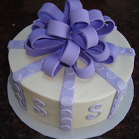 Present Cake this is very popular design for me. lots of different colors done...some with polka dots some without. this one has an "S" on it...