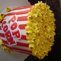 Popcorn Bucket This was for my daughter's 9th birthday. it is all buttercream except for the red stripes and the word POPCORN. the popcorn itself is...