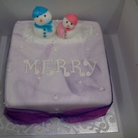 Mr And Mrs Snow This was a vanilla scatch sour cream cake with vanilla buttercream. The figurines are made from fondant and the snowmen are sittling on a...