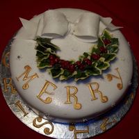 Christmas Wreath I made each leaf individually, hand painted the ivy and glazed them. Then bound the wires to make a wreath. The berries are made with...