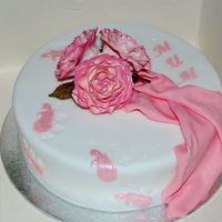 Pink Rose The roses were made from gumpaste and the drape was 50/50 fondant and gumpaste. Thanks for looking :)