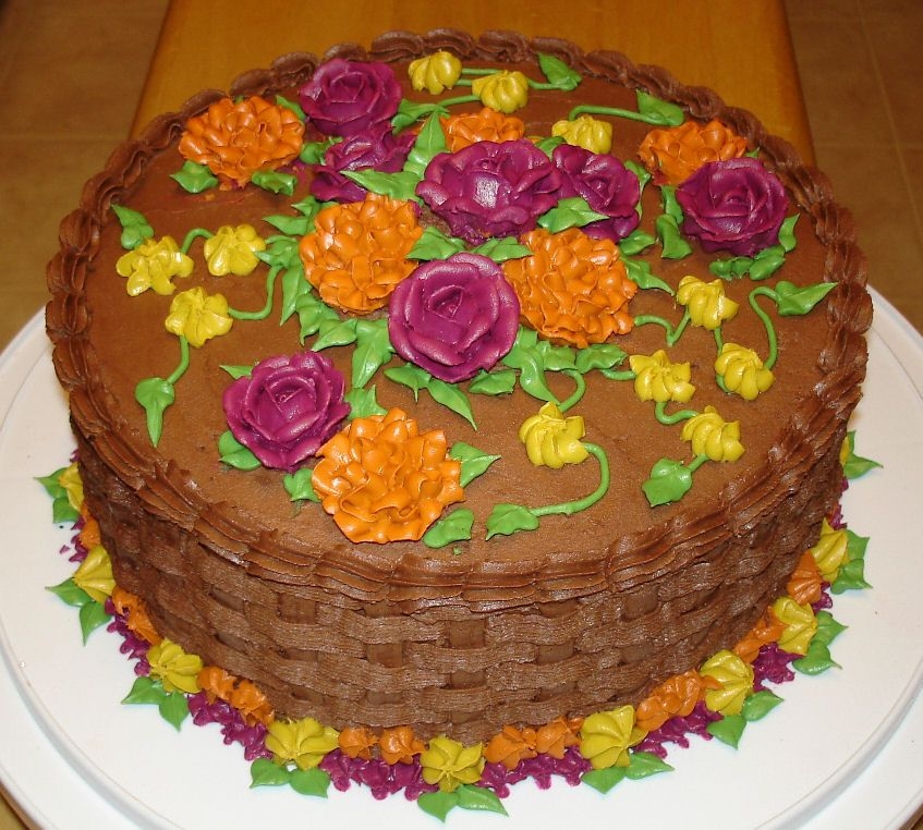 Floral Thanksgiving Cake This cake is chocolate fudge with chocolate buttercream icing decorated in buttercream flowers.