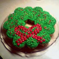 Wreath Cupcake Cake Cupcakes shaped like a wreath and the iced. Decorated with sprinkles and mm's. This would be a lot of fun to do with childrenI really...
