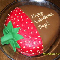 Chocolate Covered Strawberry A red velvet cake frosted in buttercream, then "dipped" in chocolate fondant!