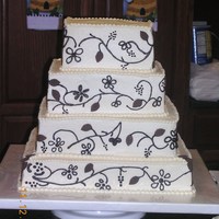 Flowery Vines Homemade carrot cake covered completely with cheesecake flavored butter cream